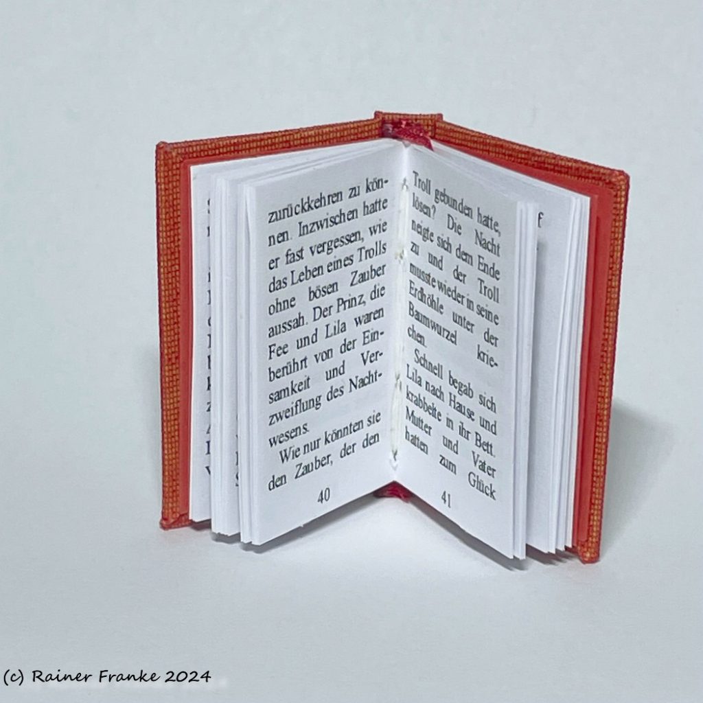 Das Mädchen und die Pusteblumen - Fadenheftung