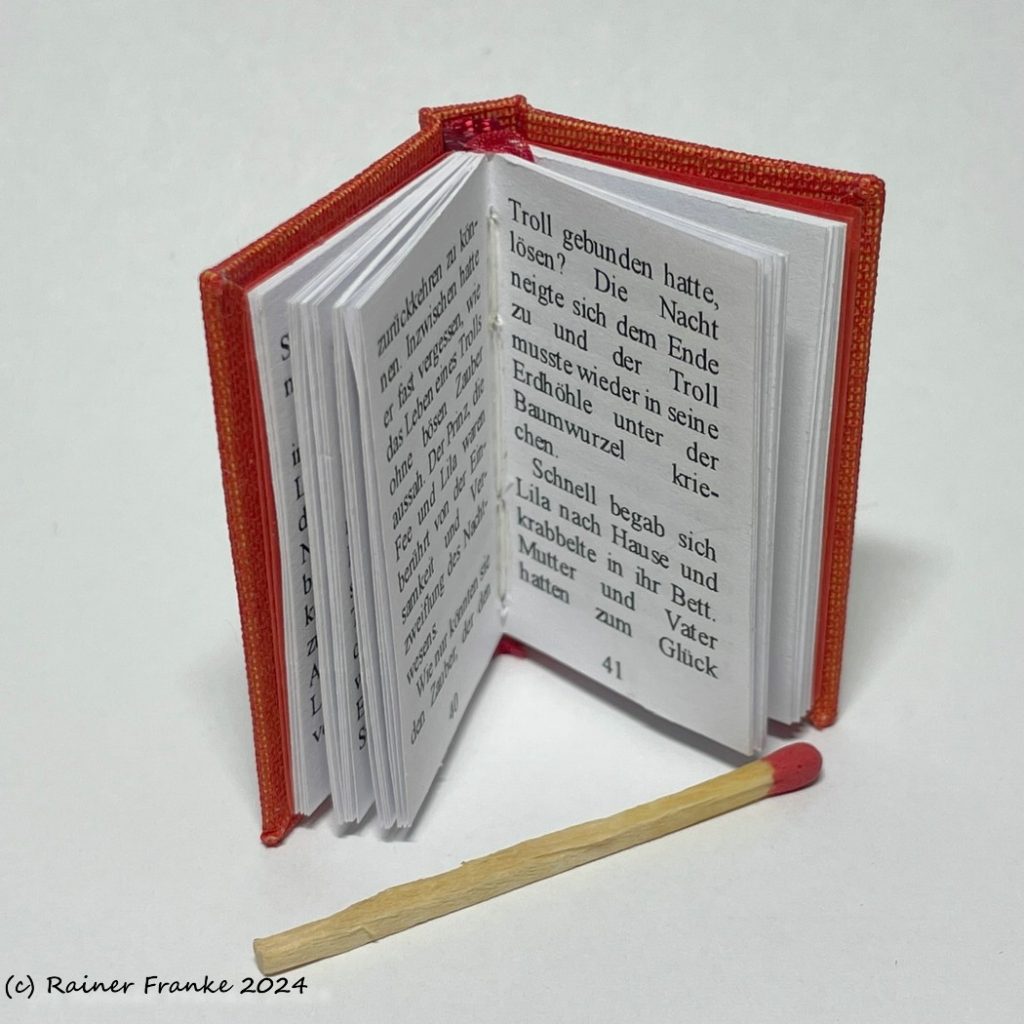 Das Mädchen und die Pusteblumen - Fadenheftung